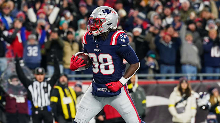 Jan 4, 2026; Foxborough, Massachusetts, USA; New England Patriots running back Rhamondre Stevenson (38) reacts after running for a two-yard touchdown against the Miami Dolphins during the first quarter at Gillette Stadium. Mandatory Credit: David Butler II-Imagn Images