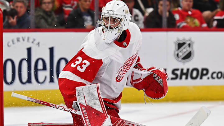 Oct 1, 2022; Chicago, Illinois, USA;  Detroit Red Wings goaltender Sebastian Cossa (33) defends the net against the Chicago Blackhawks at United Center. Mandatory Credit: Jamie Sabau-Imagn Images