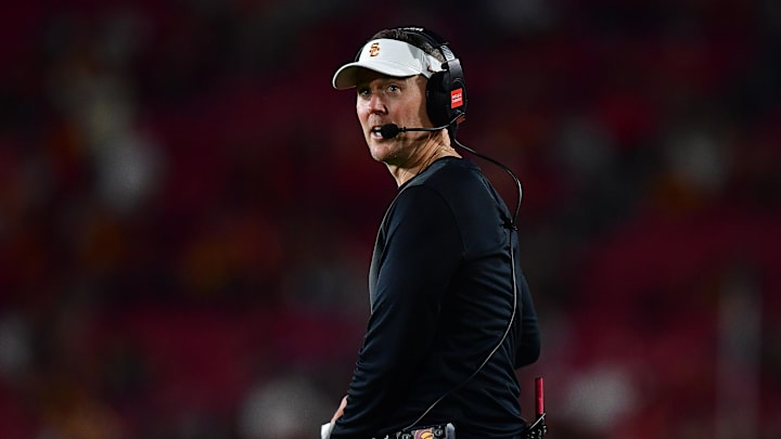 Sep 20, 2025; Los Angeles, California, USA; Southern California Trojans head coach Lincoln Riley watches game action against the Michigan State Spartans during the second half at the Los Angeles Memorial Coliseum. Mandatory Credit: Gary A. Vasquez-Imagn Images