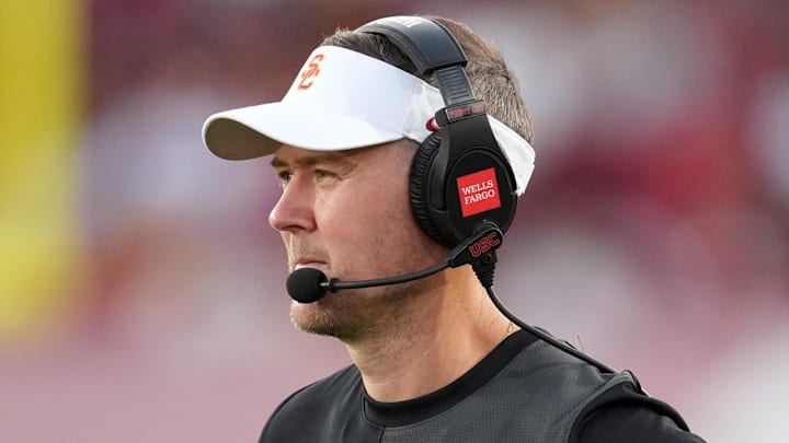 Aug 30, 2025; Los Angeles, California, USA; Southern California Trojans head coach Lincoln Riley watches from the sidelines against the Missouri State Bears in the first half at United Airlines Field at Los Angeles Memorial Coliseum. Mandatory Credit: Kirby Lee-Imagn Images