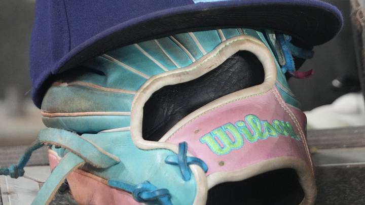 Sep 26, 2025; Toronto, Ontario, CAN; The hat and glove of Tampa Bay Rays third baseman Junior Caminero (13) in the dugout during the game against the Toronto Blue Jays at Rogers Centre. 