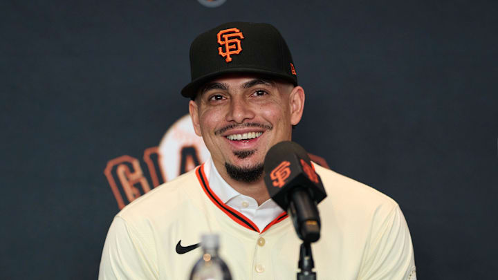 Dec 12, 2024; San Francisco, CA, USA; San Francisco Giants shortstop Willy Adames reacts during his introductory press conference at Oracle Park.