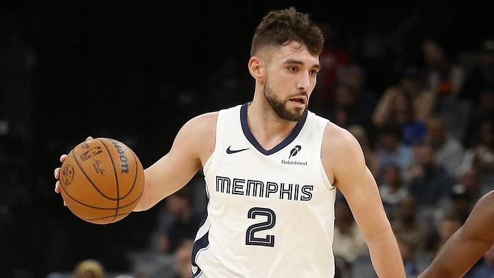 Mar 7, 2026; Memphis, Tennessee, USA; Memphis Grizzlies guard Ty Jerome (2) dribbles as Los Angeles Clippers guard Kris Dunn (8) defends during the first quarter at FedExForum. Mandatory Credit: Petre Thomas-Imagn Images