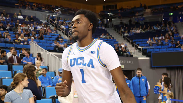 Nov 7, 2025; Los Angeles, California, USA;  UCLA Bruins center Xavier Booker (1) runs to the court prior to the game against the Pepperdine Waves at Pauley Pavilion presented by Wescom Financial. Mandatory Credit: Kiyoshi Mio-Imagn Images