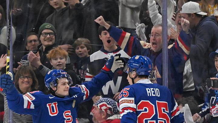 Dec 31, 2025; St. Paul, Minnesota, USA; USA defensemen Chase Reid celebrates his power play goal against Sweden with forward James Hagens during the second period in group play during the 2026 IIHF World Junior Championship at Grand Casino Arena. Dec 31, 2025; St. Paul, Minnesota, USA; USA defensemen Chase Reid celebrates his power play goal against Sweden with forward James Hagens during the second period in group play during the 2026 IIHF World Junior Championship at Grand Casino Arena.