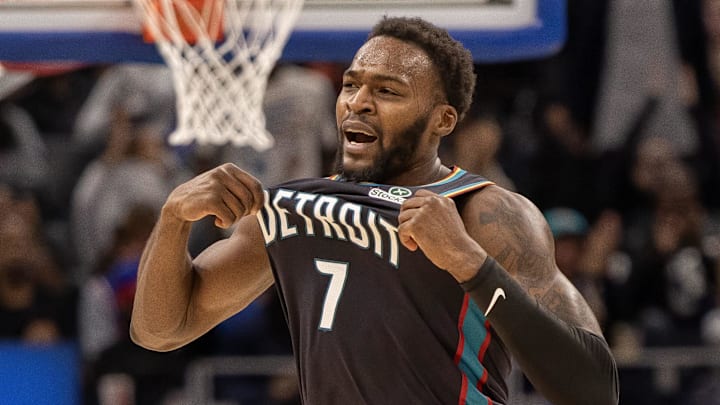 Nov 12, 2025; Detroit, Michigan, USA; Detroit Pistons forward Paul Reed (7) runs up court after his dunk against the Chicago Bulls during the second half at Little Caesars Arena. Mandatory Credit: David Reginek-Imagn Images