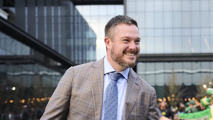 Nov 14, 2025; Eugene, Oregon, USA; Oregon Ducks head coach Dan Lanning high fives fans before a game between the Oregon Ducks and the Minnesota Golden Gophers at Autzen Stadium. 