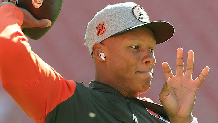 Cleveland Browns quarterback Josh Dobbs warms up for a game.