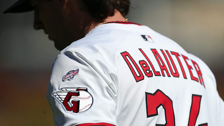 Cleveland Guardians center fielder Chase DeLauter’s MLB debut patch is seen on his shoulder as he warms up before Game 2 of the American League wild card series at Progressive Field, Oct. 1, 2025, in Cleveland, Ohio.
