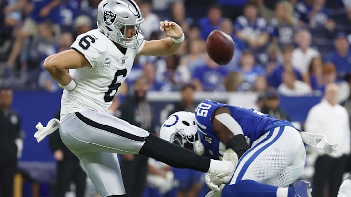 Oct 5, 2025; Indianapolis, Indiana, USA; Indianapolis Colts linebacker Segun Olubi (50) blocks a punt by Las Vegas Raiders punter AJ Cole (6) during the second quarter at Lucas Oil Stadium. Mandatory Credit: Trevor Ruszkowski-Imagn Images Oct 5, 2025; Indianapolis, Indiana, USA; Indianapolis Colts linebacker Segun Olubi (50) blocks a punt by Las Vegas Raiders punter AJ Cole (6) during the second quarter at Lucas Oil Stadium. Mandatory Credit: Trevor Ruszkowski-Imagn Images