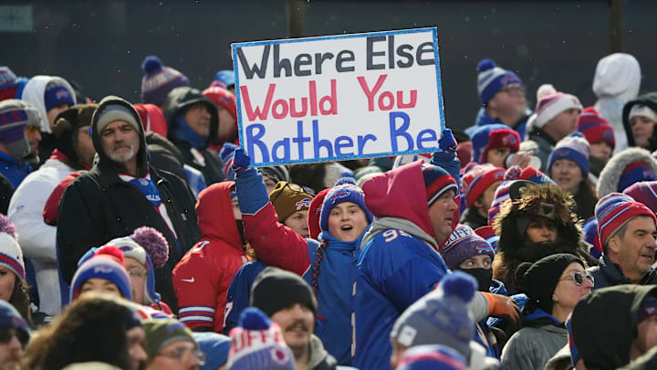 Bills fans hold up signs celebrating the team and the stadium during the first half of their game at Highmark Stadium in Orchard Park Sunday, Jan. 4, 2026.