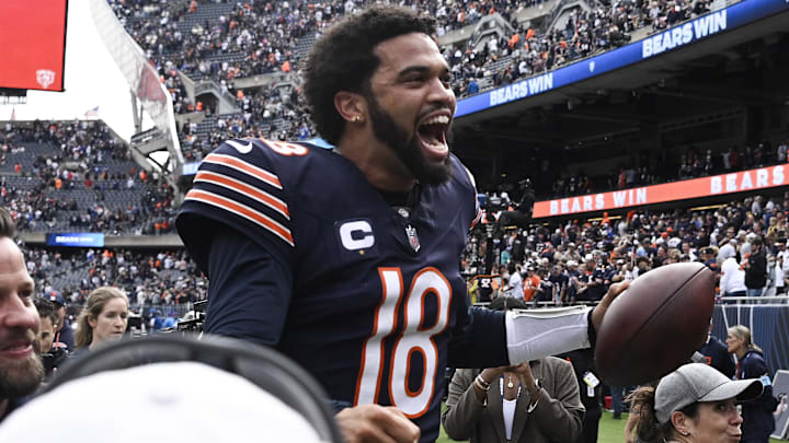 Sep 29, 2024; Chicago, Illinois, USA;  Chicago Bears quarterback Caleb Williams (18) greets fans after the second half against the Los Angeles Rams at Soldier Field. Mandatory Credit: Matt Marton-Imagn Images
