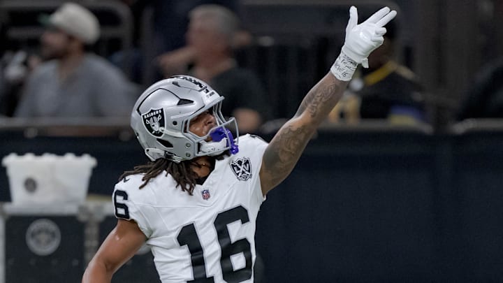 Dec 29, 2024; New Orleans, Louisiana, USA; Las Vegas Raiders wide receiver Jakobi Meyers (16) signals a first down against the New Orleans Saints at Caesars Superdome. Mandatory Credit: Matthew Hinton-Imagn Images