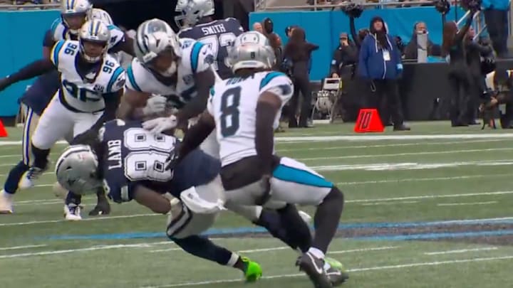 Carolina's  Xavier Woods was called for unnecessary roughness for this hit on Dallas' CeeDee Lamb.