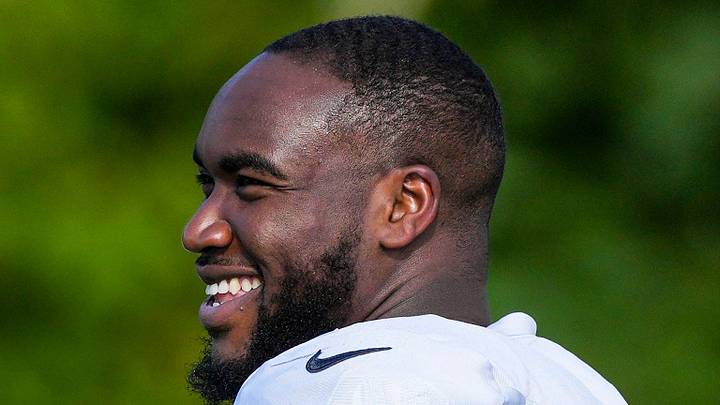 Indianapolis Colts defensive tackle Adetomiwa Adebawore smiles