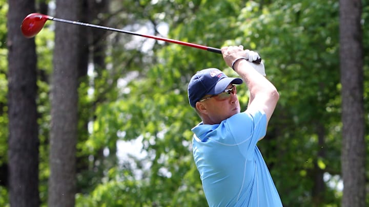 Apr 30, 2013; Greensboro, GA, USA;  Mississippi Rebels head football coach Hugh Freez tees off during the Chick-fil-A Challenge at the Reynolds Plantation Resort. Mandatory Credit: Daniel Shirey/CFA-pr via Imagn Images 