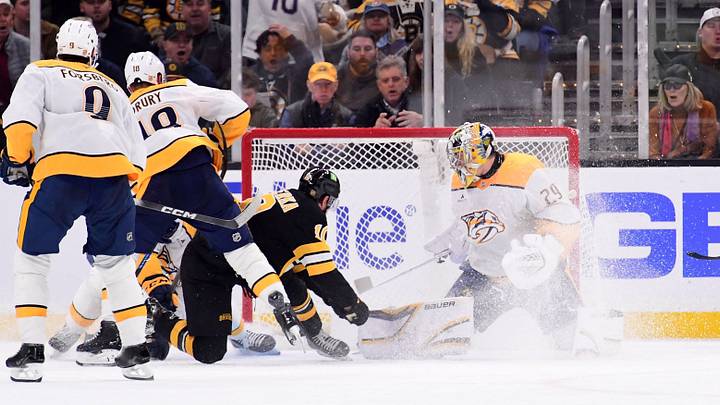 Oct 22, 2026; Boston, Massachusetts, USA; Boston Bruins right wing JJ Peterka (10) tips the puck past Nashville Predators goaltender Justus Annunen (29) during the second period at TD Garden. Mandatory Credit: Bob DeChiara-Imagn Images Oct 22, 2026; Boston, Massachusetts, USA; Boston Bruins right wing JJ Peterka (10) tips the puck past Nashville Predators goaltender Justus Annunen (29) during the second period at TD Garden. Mandatory Credit: Bob DeChiara-Imagn Images