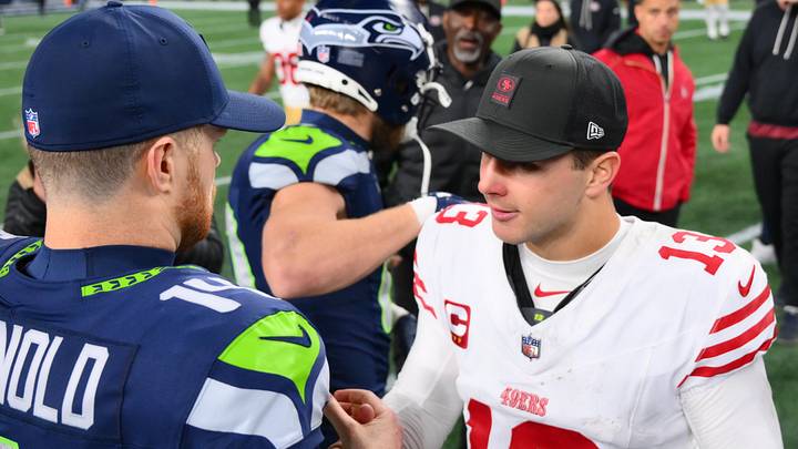 Seattle Seahawks quarterback Sam Darnold (14) and San Francisco 49ers quarterback Brock Purdy (13) Seattle Seahawks quarterback Sam Darnold (14) and San Francisco 49ers quarterback Brock Purdy (13)