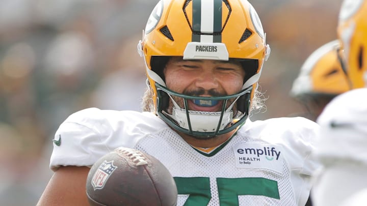 Green Bay Packers center Sean Rhyan was given 33 million reasons to smile. Green Bay Packers center Sean Rhyan was given 33 million reasons to smile.