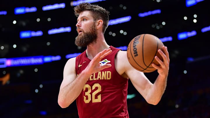 Dec 31, 2024; Los Angeles, California, USA; Cleveland Cavaliers forward Dean Wade (32) controls the ball against the Los Angeles Lakers during the second half at Crypto.com Arena. Mandatory Credit: Gary A. Vasquez-Imagn Images