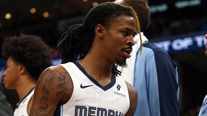 Dec 5, 2024; Memphis, Tennessee, USA; Memphis Grizzlies guard Ja Morant (12) walks off the court after being ejected during the fourth quarter against the Sacramento Kings at FedExForum.