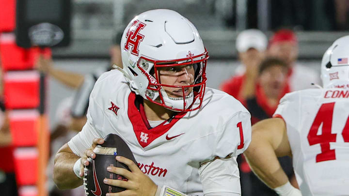 Houston Cougars quarterback Conner Weigman looks to pass during the first quarter against the UCF Knights at Acrisure Bounce House. 