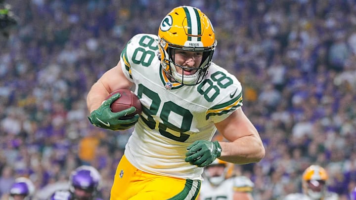Dec 29, 2024; Minneapolis, Minnesota, USA; Green Bay Packers tight end Luke Musgrave (88) runs after the catch against Minnesota Vikings in the first half at U.S. Bank Stadium. Mandatory Credit: Brad Rempel-Imagn Images