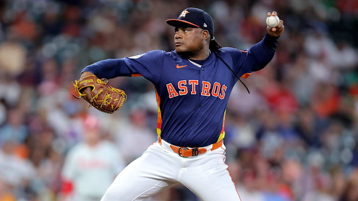 Jun 24, 2025; Houston, Texas, USA; Houston Astros starting pitcher Framber Valdez (59) delivers a pitch against the Philadelphia Phillies during the first inning at Daikin Park. 