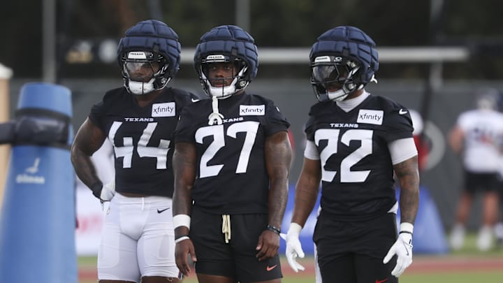 Jul 23, 2025; Houston, TX, USA;  Houston Texans running back British Brooks (44) and running back Woody Marks (27) and running back Jawhar Jordan (22) during training camp at Houston Methodist Training Center. Mandatory Credit: Troy Taormina-Imagn Images