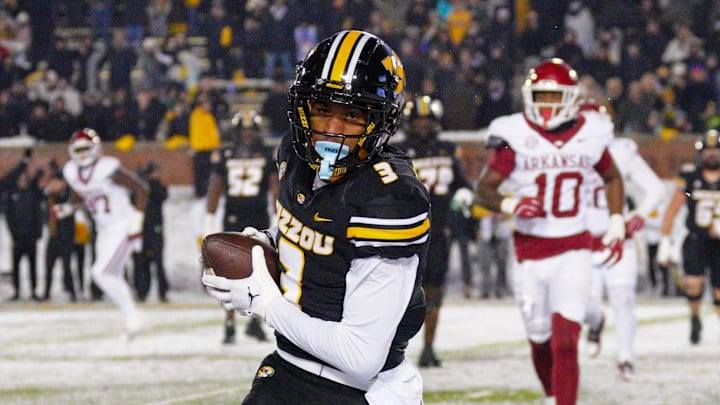 Nov 30, 2024; Columbia, Missouri, USA; Missouri Tigers wide receiver Luther Burden III (3) catches a pass for a two point conversion against the Arkansas Razorbacks during the second half at Faurot Field at Memorial Stadium. Mandatory Credit: Denny Medley-Imagn Images Nov 30, 2024; Columbia, Missouri, USA; Missouri Tigers wide receiver Luther Burden III (3) catches a pass for a two point conversion against the Arkansas Razorbacks during the second half at Faurot Field at Memorial Stadium. Mandatory Credit: Denny Medley-Imagn Images