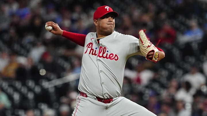 May 21, 2025; Denver, Colorado, USA; Philadelphia Phillies relief pitcher Carlos Hernandez (35) delivers a pitch in the ninth inning against the Colorado Rockies at Coors Field