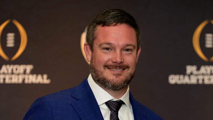 Oregon head coach Dan Lanning holds an orange during the head coaches press conference ahead of Orange Bowl on Dec. 31, 2025, in Dania Beach, Florida.