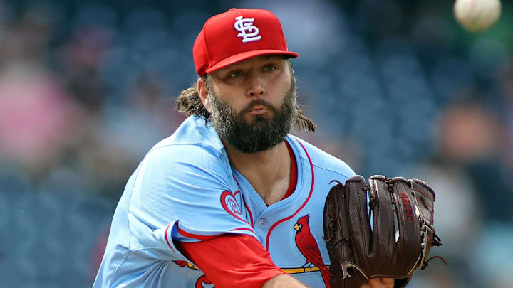 Jun 16, 2024; Washington, District of Columbia, USA; St. Louis Cardinals pitcher Lance Lynn (31) throws to first base during the first inning against the Washington Nationals at Nationals Park. Mandatory Credit: Daniel Kucin Jr.-Imagn Images