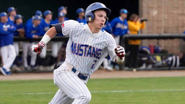Fort Cobb-Broxton's Eli Willits runs to first after hitting a fly ball during the high school baseball game between Fort Cobb-Broxton and Stillwater at Edmond Santa Fe High School in Edmond, Okla., Friday, April, 18, 2025.