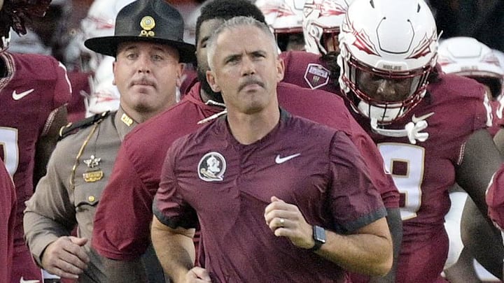 Sep 21, 2024; Tallahassee, Florida, USA; Florida State Seminoles head coach Mike Norvell leads his team out of the tunnel before the game against the California Golden Bears at Doak S. Campbell Stadium. Mandatory Credit: Melina Myers-Imagn Images