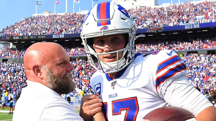 Buffalo Bills quarterback Josh Allen (17) and Tennessee Titans offensive coordinator Brian Daboll