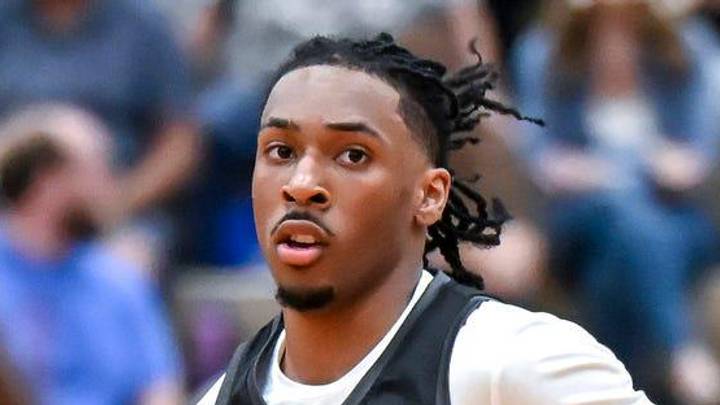 Team Motorcars and Michigan State's Carlos Medlock Jr. moves the ball against Team Faygo during the Moneyball Pro-Am on Tuesday, June 23, 2026, at Holt High School.