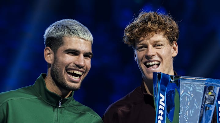 Jannik Sinner of Italy and Carlos Alcaraz of Spain laugh