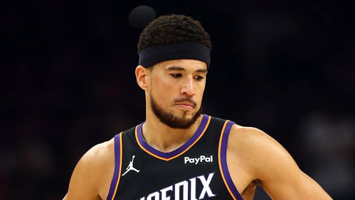 Apr 14, 2026; Phoenix, Arizona, USA; Phoenix Suns guard Devin Booker (1) against the Portland Trail Blazers during the play-in rounds of the 2026 NBA Playoffs at Mortgage Matchup Center. Mandatory Credit: Mark J. Rebilas-Imagn Images
Apr 14, 2026; Phoenix, Arizona, USA; Phoenix Suns guard Devin Booker (1) against the Portland Trail Blazers during the play-in rounds of the 2026 NBA Playoffs at Mortgage Matchup Center. Mandatory Credit: Mark J. Rebilas-Imagn Images