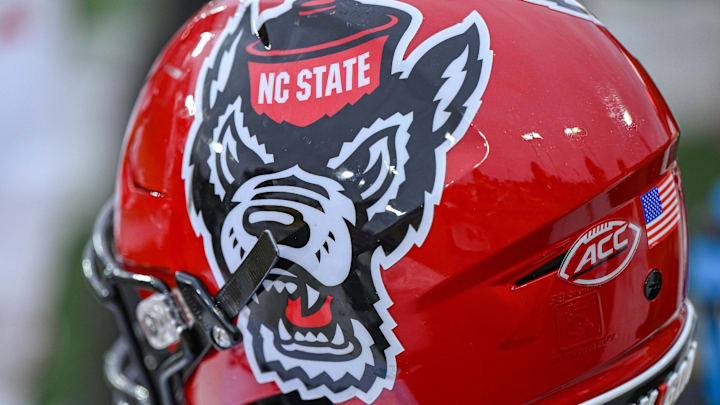 Nov 11, 2023; Winston-Salem, North Carolina, USA; The North Carolina State Wolfpack helmet rests on the bench during the second half against the Wake Forest Demon Deacons at Allegacy Federal Credit Union Stadium. Mandatory Credit: William Howard-Imagn Images