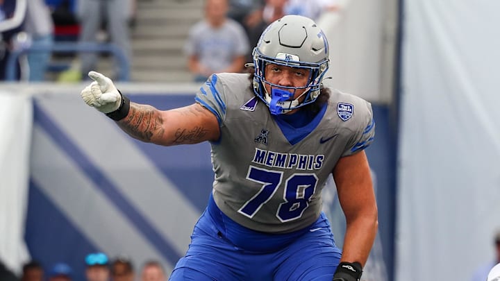 Oct 25, 2025; Memphis, Tennessee, USA; Memphis Tigers offensive lineman Travis Burke (78) gestures toward the South Florida Bulls defense on the line of scrimmage during the second half at Simmons Bank Liberty Stadium. Mandatory Credit: Wesley Hale-Imagn Images