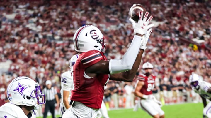 Sep 9, 2023; Columbia, South Carolina, USA; South Carolina Gamecocks wide receiver Nyck Harbor (8) makes a touchdown reception over Furman Paladins cornerback Travis Blackshear (1) during the second half at Williams-Brice Stadium. Mandatory Credit: Jeff Blake-Imagn Images