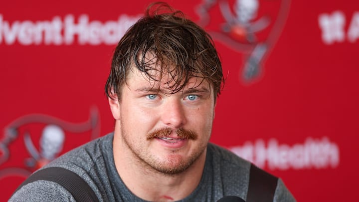 Tampa Bay Buccaneers offensive tackle Luke Goedeke (67) talks to media after training camp at AdventHealth Training Center. 