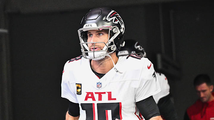 Dec 8, 2024; Minneapolis, Minnesota, USA; Atlanta Falcons quarterback Kirk Cousins (18) enters the field before the game against the Minnesota Vikings at U.S. Bank Stadium. Mandatory Credit: Jeffrey Becker-Imagn Images