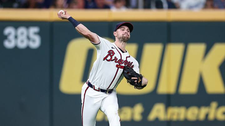 Aug 26, 2026; Cumberland, Georgia, USA;  Atlanta Braves left fielder Lane Thomas (20) throws after making a catch against the Los Angeles Dodgers in the seventh inning at Truist Park.  Mandatory Credit: Colin Hubbard-Imagn Images