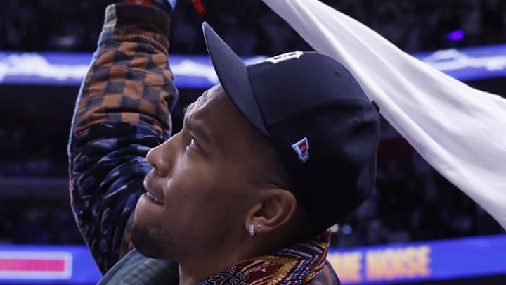 Detroit Lions Amon-Ra St. Brown watches the game between the Detroit Pistons and the New York Knicks Detroit Lions Amon-Ra St. Brown watches the game between the Detroit Pistons and the New York Knicks