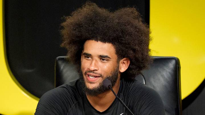 Oregon quarterback Dante Moore speaks during a press conference on Aug. 18, 2026, at the Hatfield-Dowlin Complex in Eugene, Oregon. Oregon quarterback Dante Moore speaks during a press conference on Aug. 18, 2026, at the Hatfield-Dowlin Complex in Eugene, Oregon.