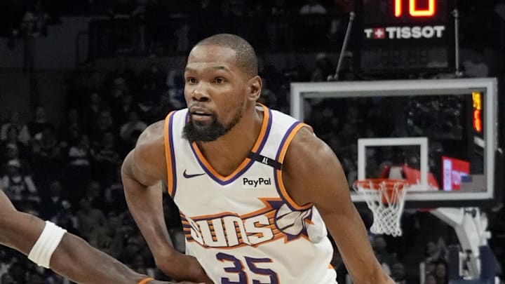 Mar 28, 2025; Minneapolis, Minnesota, USA; Phoenix Suns forward Kevin Durant (35) brings the ball up as Minnesota Timberwolves guard Anthony Edwards (5) defends him in the fourth quarter at Target Center. Mandatory Credit: Bruce Kluckhohn-Imagn Images Mar 28, 2025; Minneapolis, Minnesota, USA; Phoenix Suns forward Kevin Durant (35) brings the ball up as Minnesota Timberwolves guard Anthony Edwards (5) defends him in the fourth quarter at Target Center. Mandatory Credit: Bruce Kluckhohn-Imagn Images