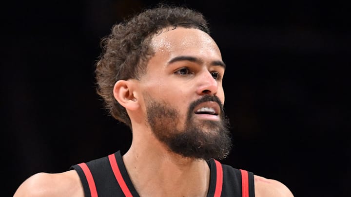 Trae Young #11 of the Atlanta Hawks reacts against the Charlotte Hornets.