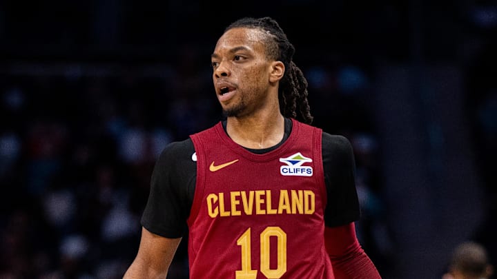Cleveland Cavaliers guard Darius Garland dribbles the ball.